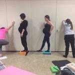 Pregnancy yoga class - using props.